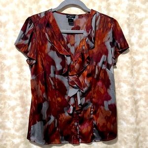 Ann Taylor two tone blouse. Ruffles in the front .